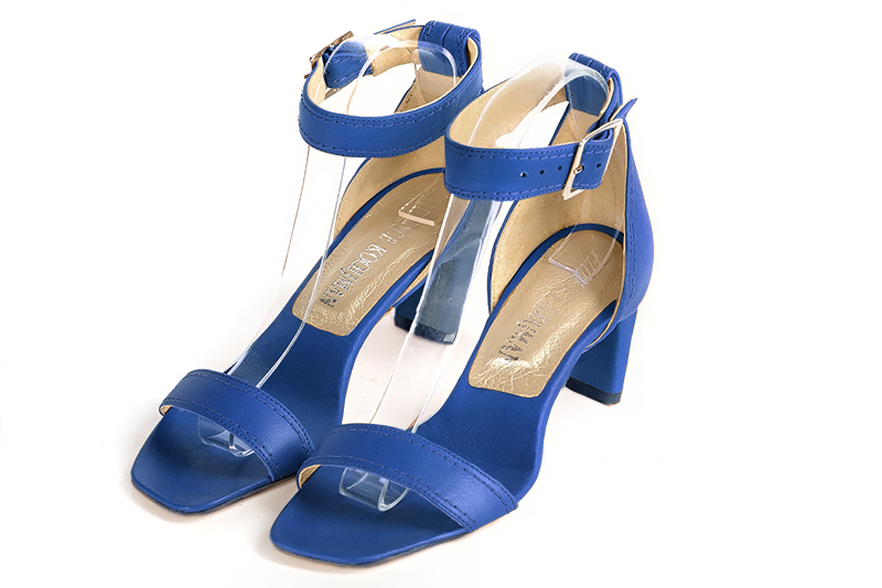 Electric blue women's closed back sandals, with a strap around the ankle. Square toe. Medium comma heels - Florence KOOIJMAN